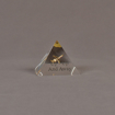 Front view of 3" x 3" pyramid acrylic embedment award with brass model of airplane cast inside.