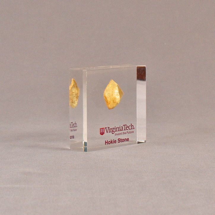 Angle view of 3 1/2" square acrylic embedment award with Virginia Tech logo and a hokie stone cast in acrylic.