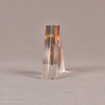 Side view of 4" triangle acrylic embedment award with copper coin mounted in clear acrylic.