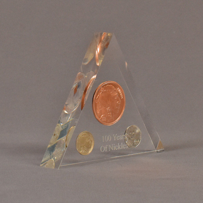 Angle view of 5" triangle acrylic embedment award with 100 Years of US nickels cast in clear acrylic.