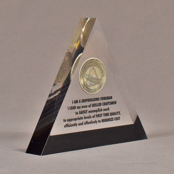 Angle view of 6" triangle acrylic embedment award with Newport News coin mounted in crystal clear acrylic.
