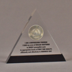 Front view of 6" triangle acrylic embedment award with Newport News coin mounted in crystal clear acrylic.