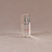 Side view of 3 1/2" x 3" rectangle acrylic embedment award with VERSAR logo and text cast into acrylic.