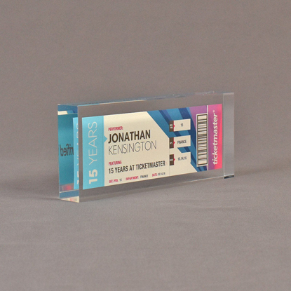Angle view of 3 1/2" x 7" rectangle acrylic embedment award with Ticketmaster ticket cast into crystal clear acrylic.