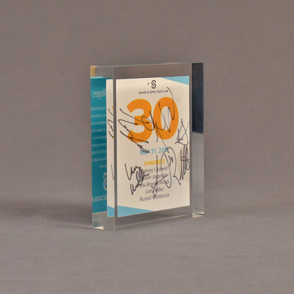 Angle view of 5 1/2" x 6" rectangle acrylic embedment award with Sports Spectacular Top 30 Honorees cast in acrylic.