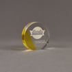 Angle view of ColorCast™ 4" Circle Acrylic Award with yellow transparent color highlight showing trophy laser engraving.