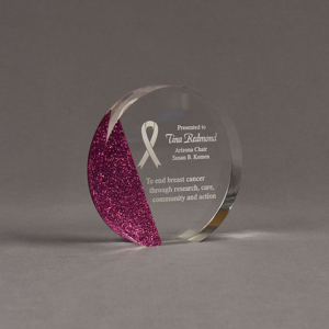 Angle view of ColorCast™ 5" Circle Acrylic Award with pink glitter color highlight showing trophy laser engraving.
