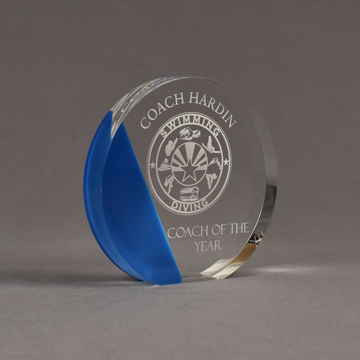 Angle view of ColorCast™ 6" Circle Acrylic Award with transparent blue color highlight showing trophy laser engraving.