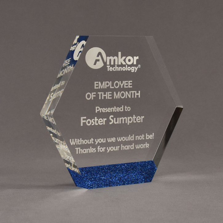 Angle view of ColorCast™ 7" Hexagon Acrylic Award with royal blue glitter color highlight showing trophy laser engraving.
