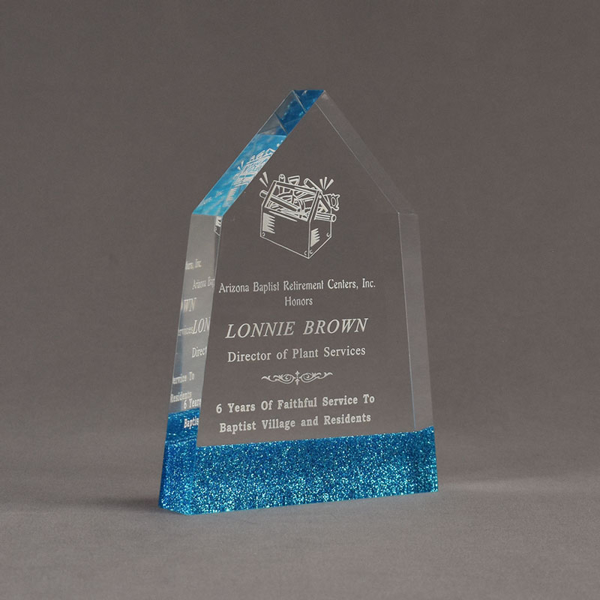 Angle view of ColorCast™ 7" Obelisk Acrylic Award with transparent blue glitter color highlight showing trophy laser engraving.