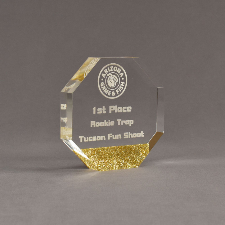 Angle view of ColorCast™ 5" Octagon Acrylic Award with gold glitter color highlight showing trophy laser engraving.