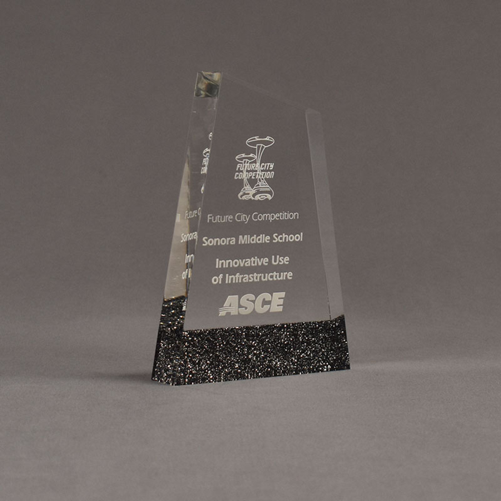 Angle view of ColorCast™ 6" Apex Acrylic Award with black glitter color highlight showing trophy laser engraving.