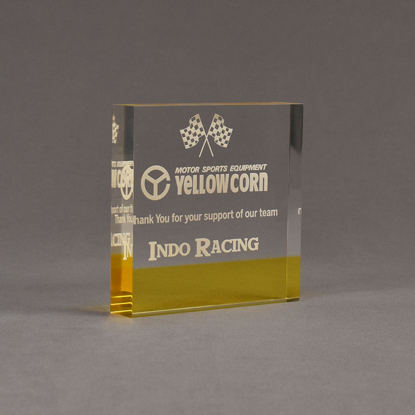 Angle view of ColorCast™ 5" Square Acrylic Award with transparent yellow color highlight showing trophy laser engraving.