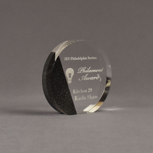 Angle view of Composites™ 5" Circle Acrylic Award with Sanded Black Onyx Staron® accent showing trophy laser engraving.