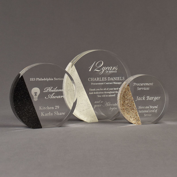 Three Composites™ Circle Acrylic Awards grouped showing Staron® Sanded Black Onyx, Sanded White Pepper and Aspen Brown accent options.