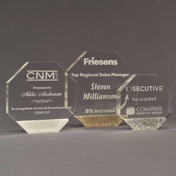 Three Composites™ Octagon Acrylic Awards grouped showing Staron® Sanded White Pepper, Aspen Brown and Platinum Grey accent options.