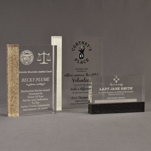 Three Composites™ Rectangle Acrylic Awards grouped showing Staron® Aspen Brown, Sanded White Pepper and Sanded Black Onyx accent options.