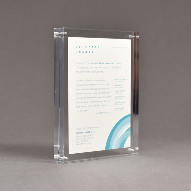 Angle view of Allure™ 6" x 8" Acrylic Entrapment Award with printed Clifford Chance message sandwiched inside two pieces of clear acrylic.