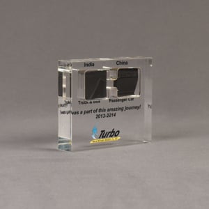 Angle view of medium Allure™ Floating Acrylic Encasement Award with passenger and truck tire sample encased into clear acrylic showing full color imprint.