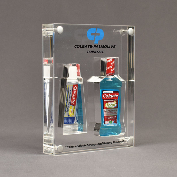 Angle view of x-large Allure™ Acrylic Encasement Award with Colgate toothpaste and mouthwash bottle encased into clear acrylic showing full color imprint.