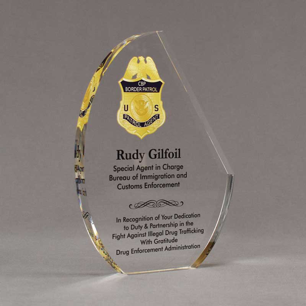 Angle view of 8" Aspect™ Crescent Acrylic Award featuring full color printed border patrol logo and text.