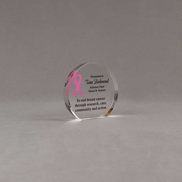 Angle view of Aspect™ 3" Round™ Acrylic Award featuring Pink Ribbon logo and end cancer text.
