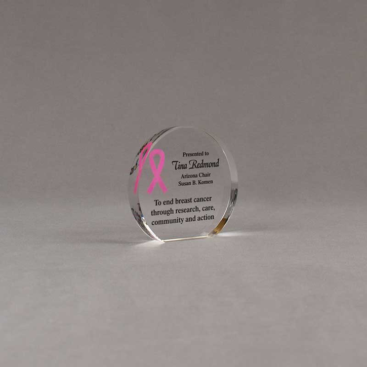 Angle view of Aspect™ 3" Round™ Acrylic Award featuring Pink Ribbon logo and end cancer text.