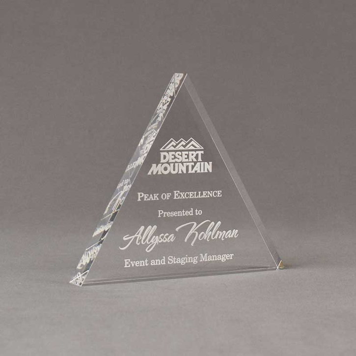 Angle view of Aspect™ 6" Triangle™ Acrylic Award featuring Desert Mountain logo laser engraved with Peak of Excellence text.
