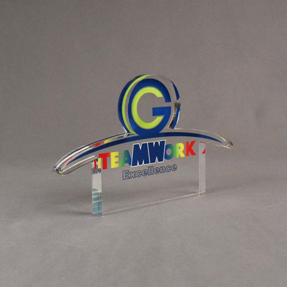Angle view of 65 Square Inch Elite Series LaserCut™ Acrylic Award with custom shape of TEAMWORK Excellence logo.