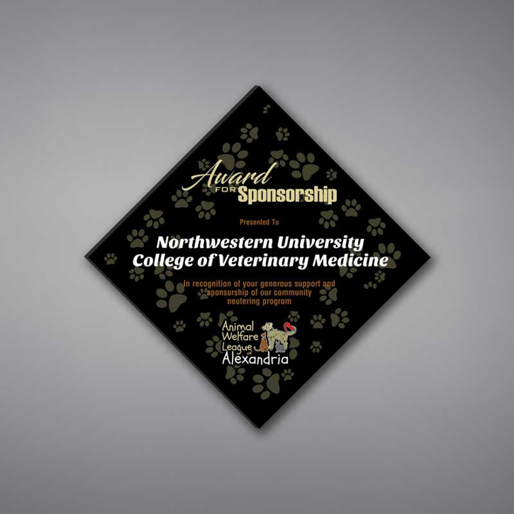 Adamas Acrylic Plaque shown 12" tall with black background and full color imprint of Northwestern University logo.