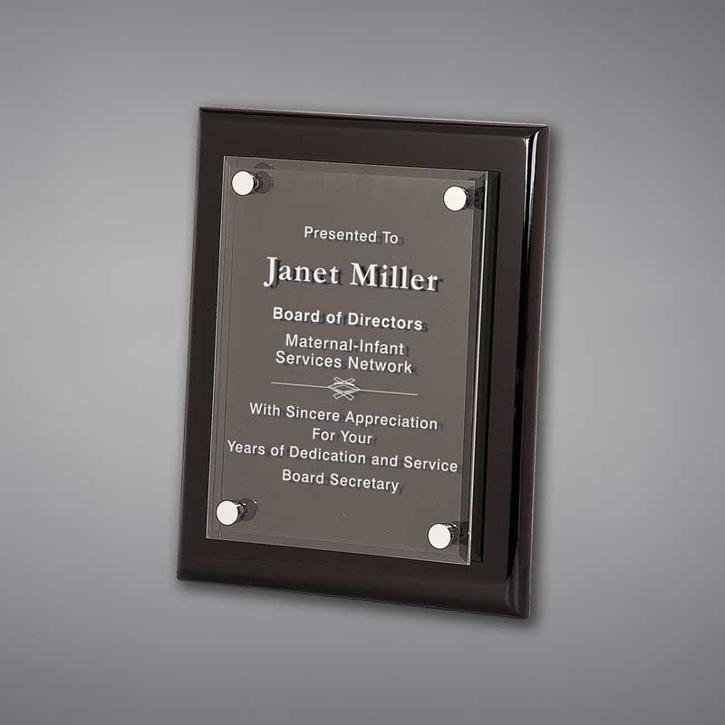 8" x 10" Black Piano Finished Plaque with acrylic cover held gracefully over plaque board with aluminum standoffs.