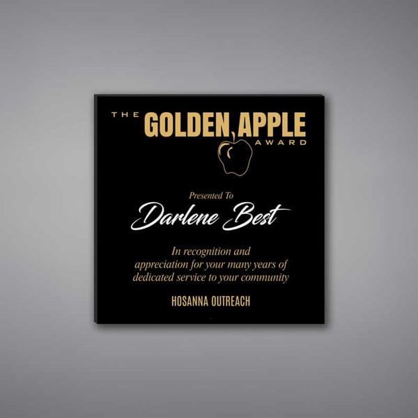 Square Shaped Acrylic Plaque 8" made of black acrylic and printed with The Golden Apple Award logo and text.