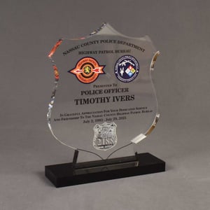 Angle view of 65 Square Inch Premiere Series LaserCut™ Acrylic Award with custom shape of Nassau police badge.